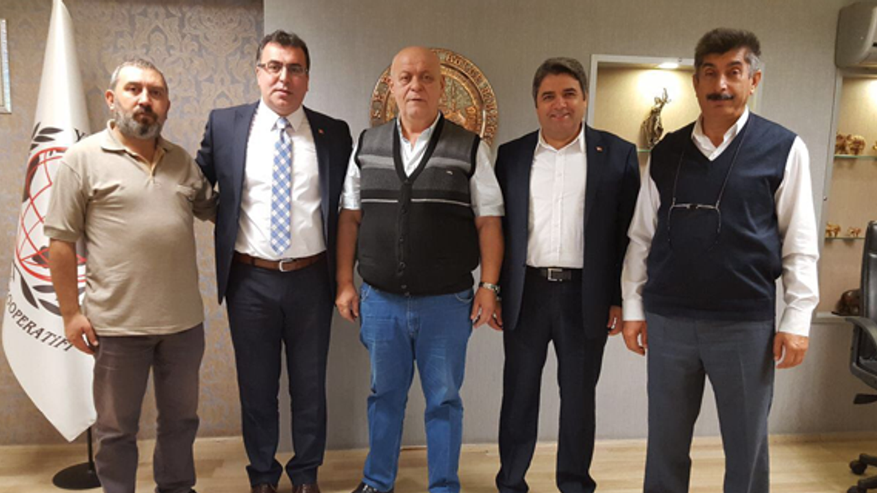 Sezer, Yunusemre Esnaf Kefalet Kooperatifi’ni ziyaret etti