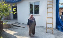 Evi yanan kadının yüzü İHA'nın haberinden sonra güldü